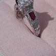 Load and play video in Gallery viewer, Video of Kirk Kara &quot;Charlotte&quot; Large Center Ruby &amp; Diamond Engagement Ring

