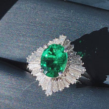 Load and play video in Gallery viewer, Video of Simon G. Oval Emerald &amp; Tapered Diamond Baguette Halo Ballerina Ring
