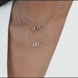 Load and play video in Gallery viewer, Gabriel &amp; Co. White Sapphire Infinity Symbol Necklace
