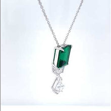 Load and play video in Gallery viewer, Lafonn Emerald Cut Simulated Emerald and Lassaire Diamond Drop Pendant
