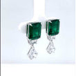 Load and play video in Gallery viewer, Lafonn Emerald Cut Simulated Emerald and Lassaire Diamond Drop Earrings
