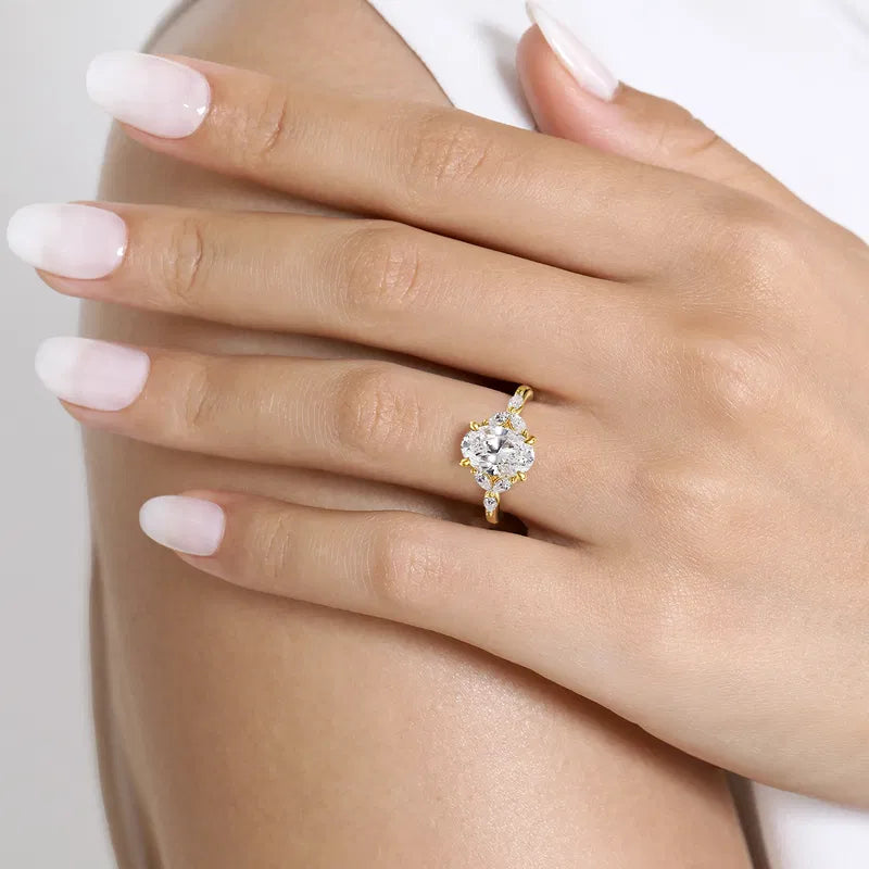 Gabriel & Co. Adella 14K Yellow Gold Floral Nouveau 2.00 Carat Oval Diamond Split Shank Engagement Ring on hand