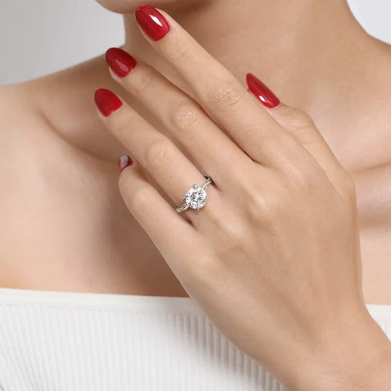 Gabriel & Co. White Gold Emersin Classic Twisted Shank 3.00 carat Diamond Engagement Ring setting on hand.
