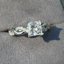 Load and play video in Gallery viewer, Artcarved &quot;Gabriella&quot; Princess Cut Twist Diamond Engagement Ring
