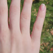 Load and play video in Gallery viewer, Simon G. Contemporary Bypass Twist Diamond Ring on Finger
