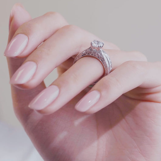 Video of Kirk Kara Stella Round Cut Diamond Engraved Engagement Ring on Finger