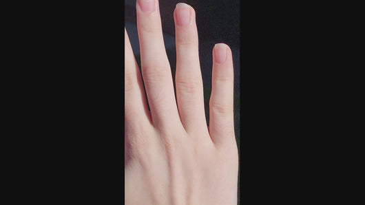 Video of Simon G. Round Cut Supernova Diamond Baguette Halo Engagement Ring on Finger