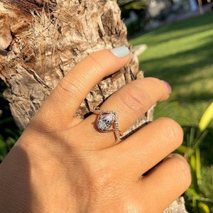 Barkev's Split Shank Twist Pear Cut Diamond Engagement Ring