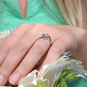 Barkev's Tension Twist Half Bezel Set Princess-Cut Blue Sapphire Engagement Ring