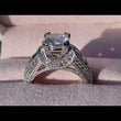 Load and play video in Gallery viewer, Kirk Kara White Gold &quot;Charlotte&quot; Kite Cut Blue Sapphire Diamond Engagement Ring Close Up View In Box Video
