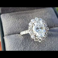 Load and play video in Gallery viewer, Ben Garelick Large Halo Oval Center Diamond Engagement Ring
