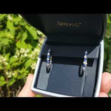 Load and play video in Gallery viewer, Simon G. Oval Shaped Skinny Sapphire &amp; Diamond Hoop Earrings
