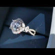 Load and play video in Gallery viewer, Simon G. Large Round Center Halo Flower Blossom Diamond Engagement Ring
