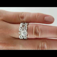 Load and play video in Gallery viewer, Kirk Kara White Gold &quot;Angelique&quot; Scroll Work Diamond Engagement Ring Set On Model Hand

