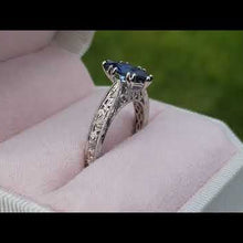 Load and play video in Gallery viewer, Kirk Kara &quot;Stella&quot; Marquise Cut Blue Sapphire Engraved Engagement Ring
