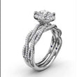 Load and play video in Gallery viewer, Fana Round Halo Twist Diamond Engagement Ring
