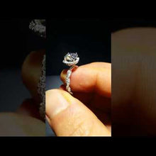 Load and play video in Gallery viewer, Gabriel &amp; Co. &quot;Carrick&quot; Cushion Halo Diamond Twist Engagement Ring
