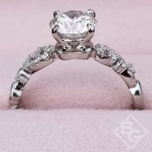 Load image into Gallery viewer, Kirk Kara White Gold &quot;Angelique&quot; Diamond Scrollwork Engagement Ring Side View In Box
