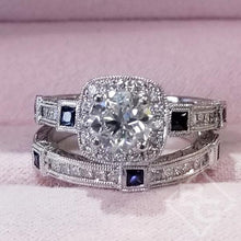 Load image into Gallery viewer, Kirk Kara White Gold &quot;Carmella&quot; Cushion Halo Baguette Station Blue Sapphire Diamond Engagement Ring Set On Box One on top of the other Close up

