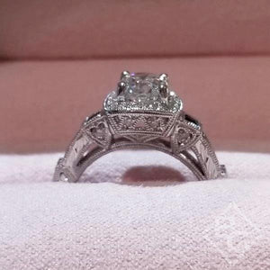 Kirk Kara White Gold "Carmella" Cushion Halo Baguette Station Blue Sapphire Diamond Engagement Ring Side View In Box