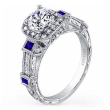 Load image into Gallery viewer, Kirk Kara White Gold &quot;Carmella&quot; Cushion Halo Baguette Station Blue Sapphire Diamond Engagement Ring Angled Side View

