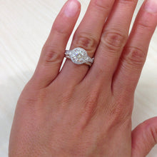 Load image into Gallery viewer, Kirk Kara White Gold &quot;Carmella&quot; Round Cut Halo Diamond Engagement Ring  On Model Hand
