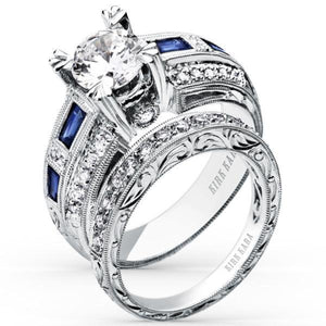 Kirk Kara White Gold "Charlotte" Baguette Cut Blue Sapphire Diamond Engagement Ring Set Angled Side View