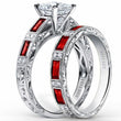 Load image into Gallery viewer, Kirk Kara White Gold &quot;Charlotte&quot; Baguette Cut Red Ruby Diamond Engagement Ring Set Angled Side View 
