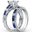 Load image into Gallery viewer, Kirk Kara White Gold &quot;Charlotte&quot; Blue Sapphire Baguette and Diamond Engagement Ring Set Angled Side View
