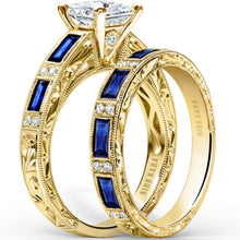 Load image into Gallery viewer, Kirk Kara Yellow Gold &quot;Charlotte&quot; Blue Sapphire Baguette and Diamond Engagement Ring Set Angled Side View 
