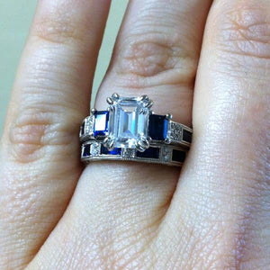 Kirk Kara White Gold "Charlotte" Blue Sapphire Baguette Cut Diamond Engagement Ring Set on Model Hand 