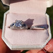 Load image into Gallery viewer, Kirk Kara White Gold &quot;Charlotte&quot; Kite Cut Blue Sapphire Diamond Engagement Ring Set Top View In Box
