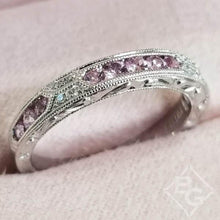 Load image into Gallery viewer, Kirk Kara White Gold &quot;Charlotte&quot; Pink Sapphire Round Cut Diamond Wedding Band Angled Top View In Box
