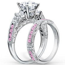 Load image into Gallery viewer, Kirk Kara White Gold &quot;Charlotte&quot; Pink Sapphire Three Stone Diamond Engagement Ring Set Angled Side View
