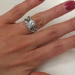 Load image into Gallery viewer, Kirk Kara White Gold &quot;Dahlia&quot; Green Tsavorite Garnet Leaf Diamond Engagement Ring Set On Model Hand
