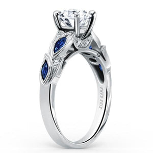 Kirk Kara White Gold "Dahlia" Marquise Cut Blue Sapphire Diamond Engagement Ring Angled Side View 