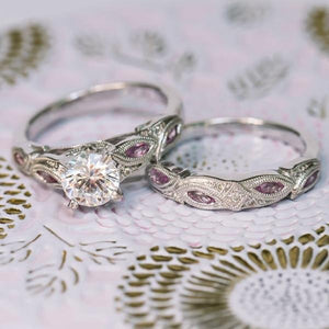 Kirk Kara White Gold "Dahlia" Marquise Cut Pink Sapphire Diamond Engagement Ring Set Shown Together Top Angled View