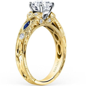 Kirk Kara  Yellow Gold Dahlia Marquise Shaped Blue Sapphire Diamond Engagement Ring Angled Side View 
