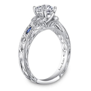 Kirk Kara White Gold Dahlia Marquise Shaped Blue Sapphire Diamond Engagement Ring Angled Side View