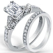 Load image into Gallery viewer, Kirk Kara White Gold &quot;Lori&quot; Emerald Cut Diamond Engagement Ring Set Angled Side View

