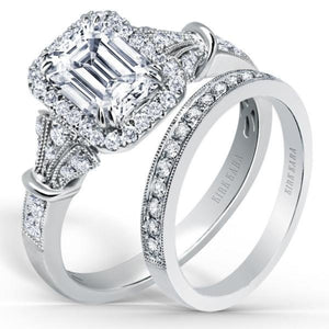 Kirk Kara White Gold "Lori" Emerald Cut Halo Diamond Engagement Ring Set Angled Side View