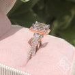 Load image into Gallery viewer, Kirk Kara  White &amp; Rose Gold Pirouetta Large Princess Cut Halo Diamond Engagement Ring Angled View In Box 
