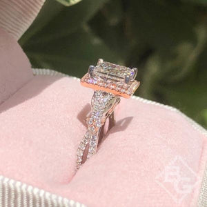 Kirk Kara  White & Rose Gold Pirouetta Large Princess Cut Halo Diamond Engagement Ring Angled View In Box 