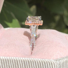 Load image into Gallery viewer, Kirk Kara  White &amp; Rose Gold Pirouetta Large Princess Cut Halo Diamond Engagement Ring Side View in box
