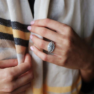 Kirk Kara White Gold "Pirouetta" Three Stone Halo Diamond Engagement Ring Set On Model Hand