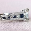 Load image into Gallery viewer, Kirk Kara White Gold &quot;Stella&quot; Blue Sapphire Small Center Princess Cut Engagement Ring Side View Close up
