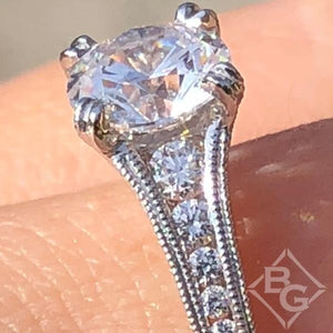 Kirk Kara White Gold "Stella" Graduating Diamond Engagement Ring on model close up