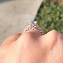 Load image into Gallery viewer, Kirk Kara White Gold &quot;Stella&quot; Graduating Diamond Engagement Ring on model side view
