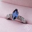 Load image into Gallery viewer, Kirk Kara Stella Marquise Cut Blue Sapphire Engraved Engagement Ring
