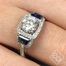 Load image into Gallery viewer, Simon G. Halo Three Stone Blue Sapphire Engagement Ring
